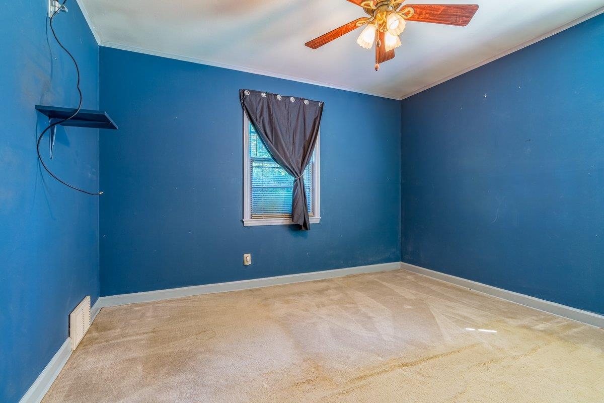 6237 Brunswick Road Arlington, TN 38002 - Photo 16 of 25 a view of a livingroom with a fan