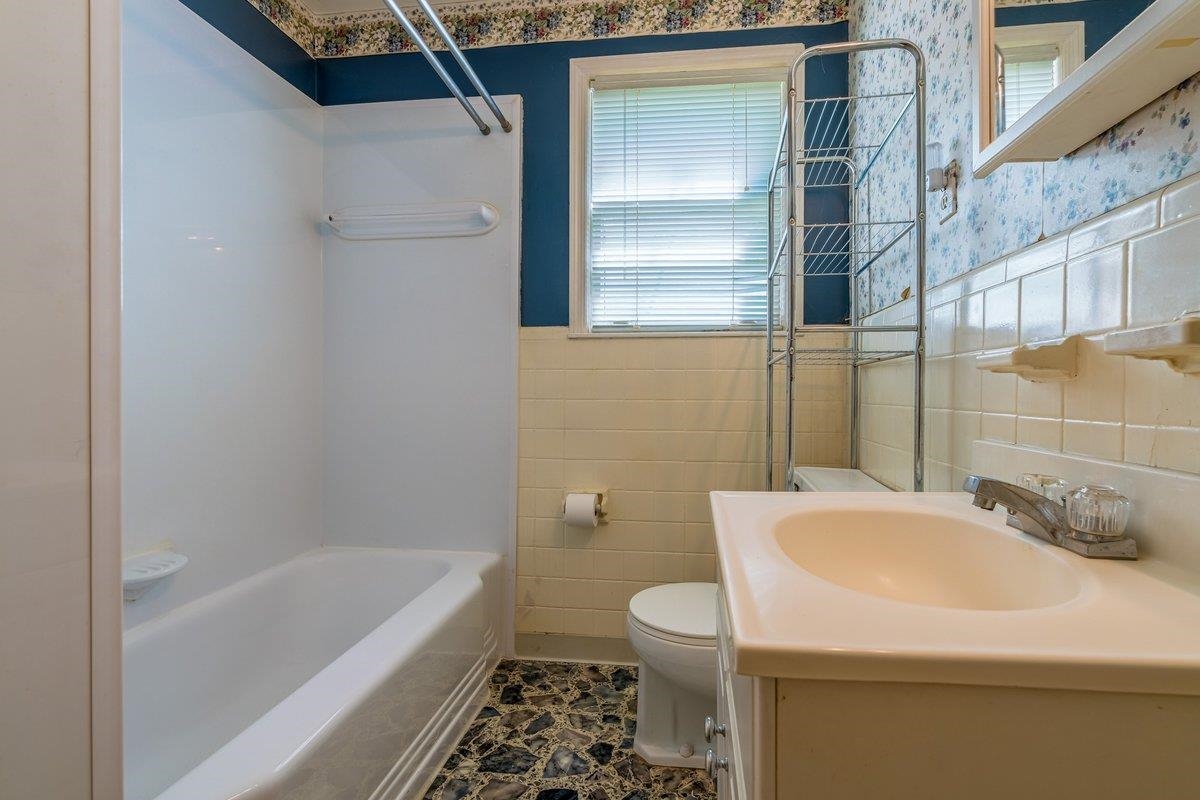 6237 Brunswick Road Arlington, TN 38002 - Photo 17 of 25 a bathroom with a sink toilet and shower