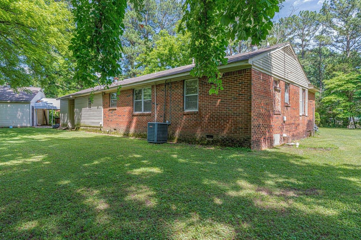 6237 Brunswick Road Arlington, TN 38002 - Photo 23 of 25 a view of a house with backyard and garden