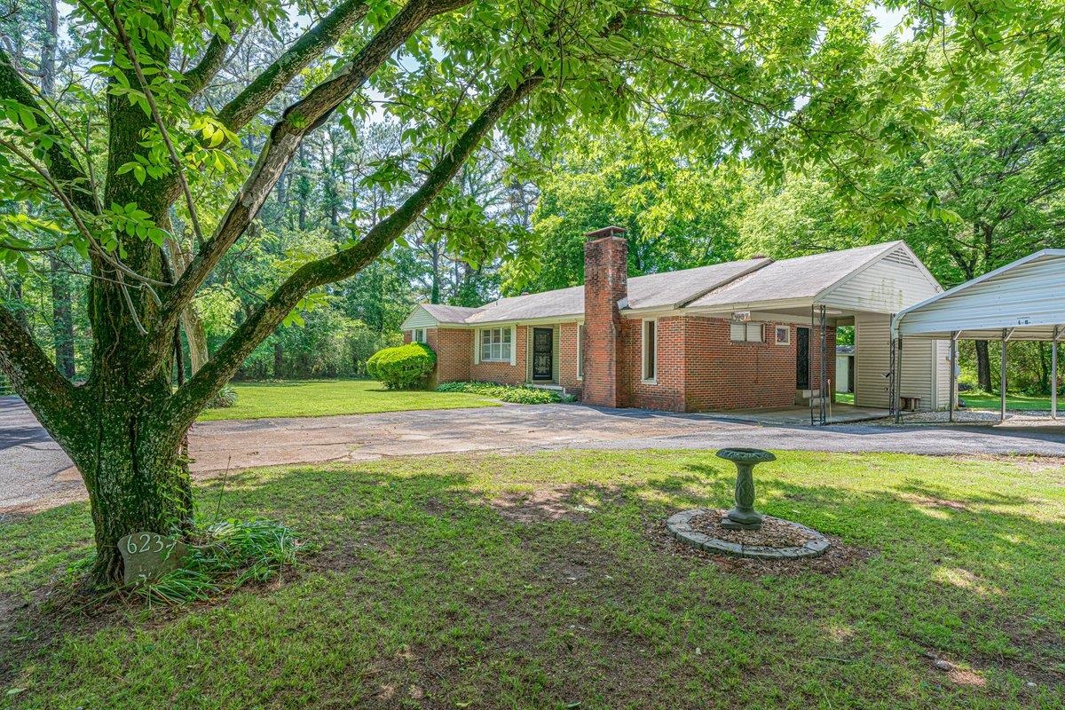 6237 Brunswick Road Arlington, TN 38002 - Photo 3 of 25 a front view of a house with yard and green space