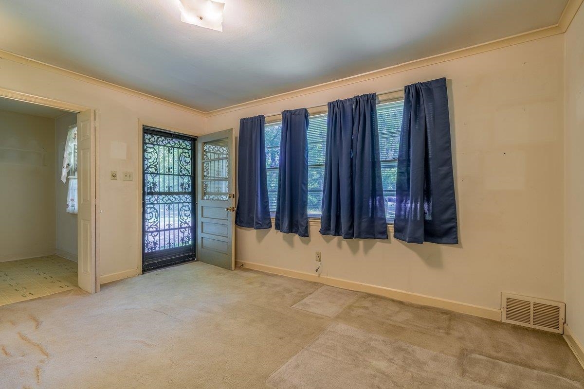 6237 Brunswick Road Arlington, TN 38002 - Photo 4 of 25 an empty room with windows