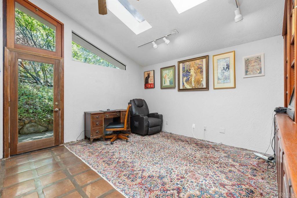 29560 Lilac Road Valley Center, CA 92082 - Photo 17 of 43 a bedroom with a bed and a window