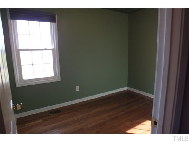 1874 Steven's Chapel Road Smithfield, NC 27577 - Photo 16 of 22 Bedroom 2 with hardwood floors
