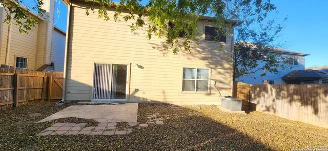 a view of staircase and utility room