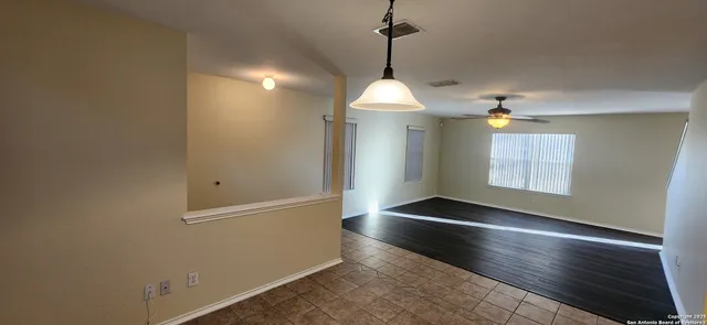 a bathroom with a sink mirror vanity and toilet