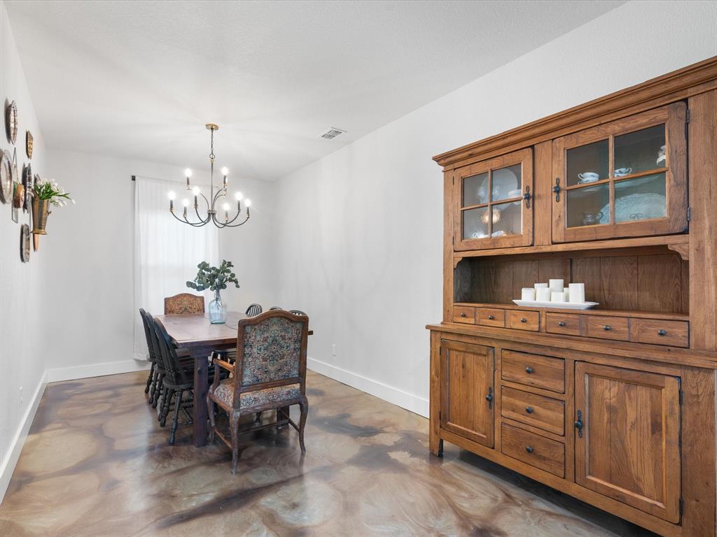405 Advance Road Weatherford, TX 76088 - Photo 18 of 35 a view of a dining room with furniture