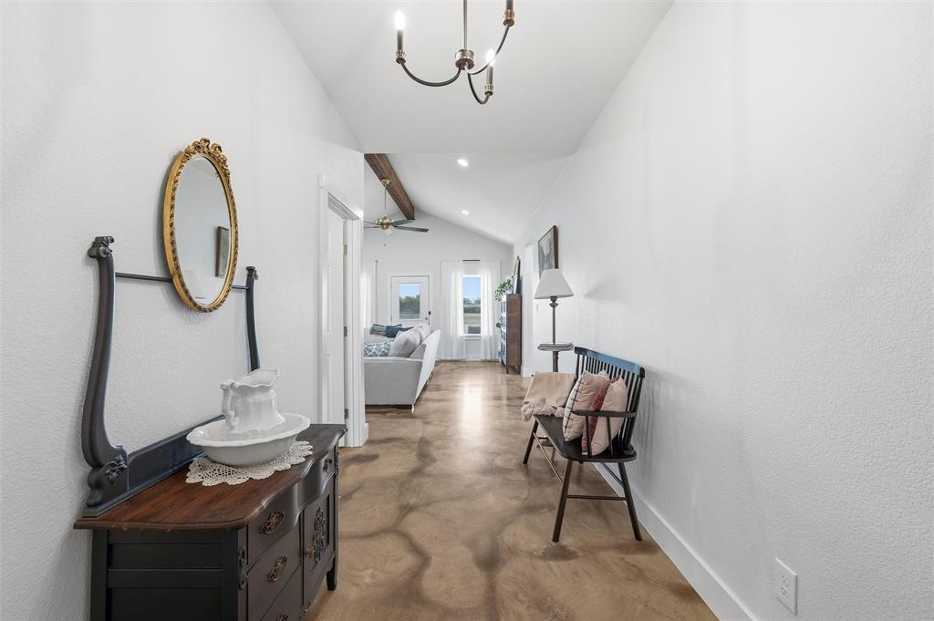 405 Advance Road Weatherford, TX 76088 - Photo 4 of 35 a view of a room with gym equipment