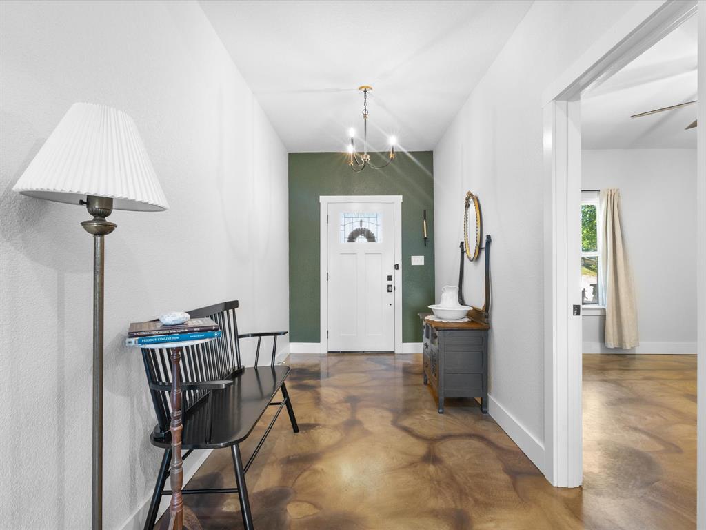 405 Advance Road Weatherford, TX 76088 - Photo 5 of 35 a view of a hallway with seating area