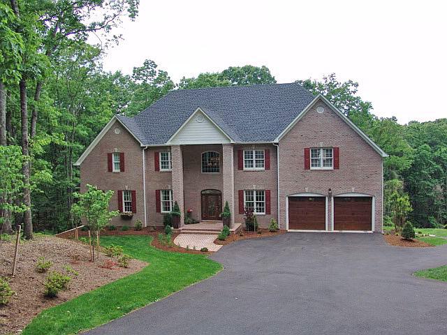 5251 Falcon Ridge Road Roanoke, VA 24018 - Photo 1 of 15 a view of a house with a yard and large tree