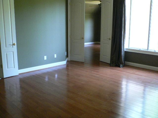 5251 Falcon Ridge Road Roanoke, VA 24018 - Photo 5 of 15 an empty room with wooden floor and windows