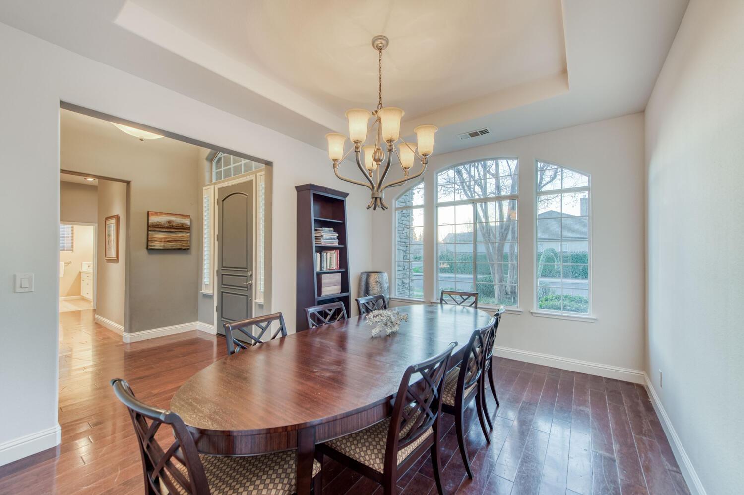 1081 North Harvard Avenue Clovis, CA 93611 - Photo 23 of 57 a view of a dining room with furniture window and wooden floor