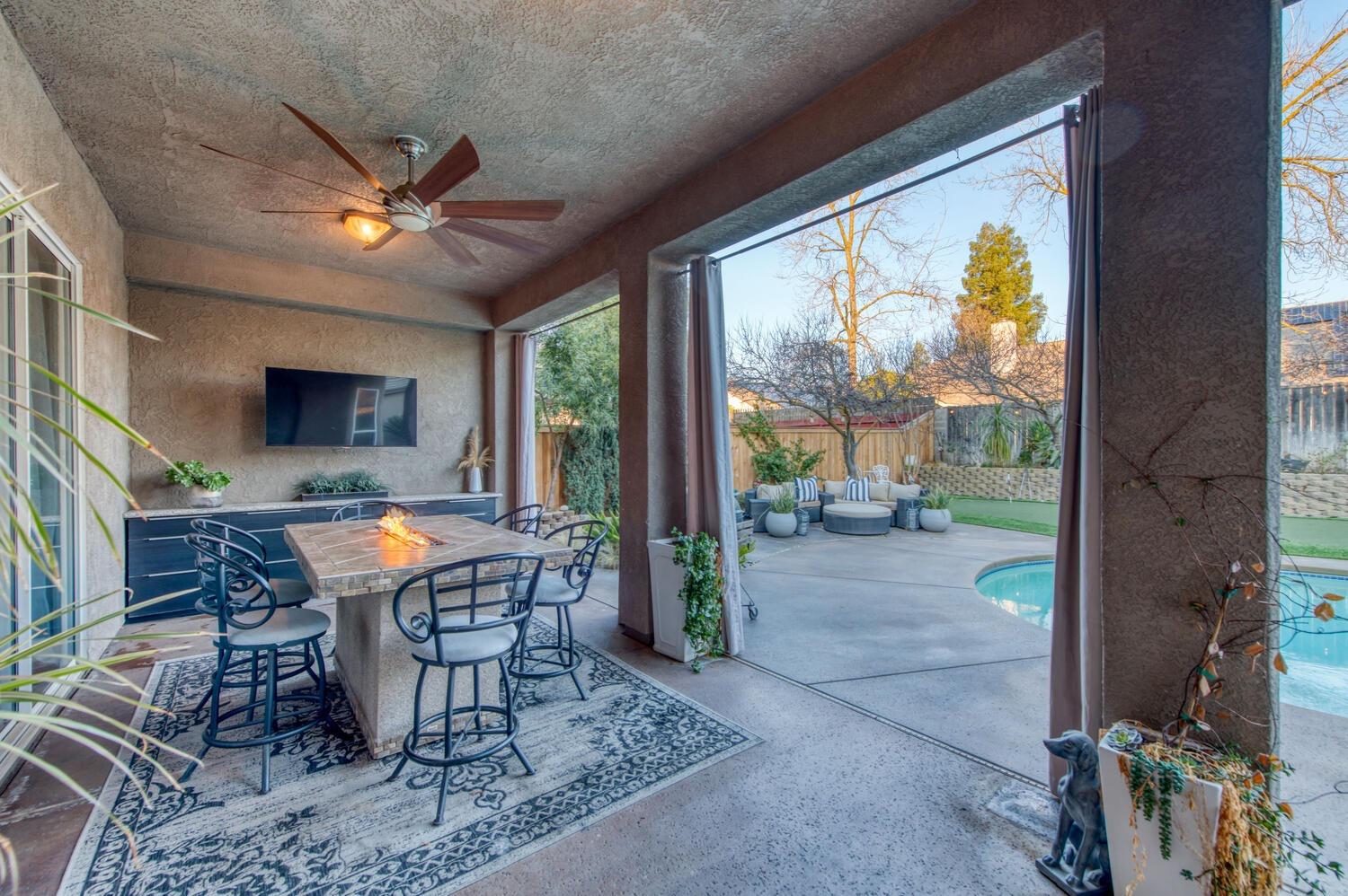 1081 North Harvard Avenue Clovis, CA 93611 - Photo 35 of 57 a view of a dining room with furniture window and outside view