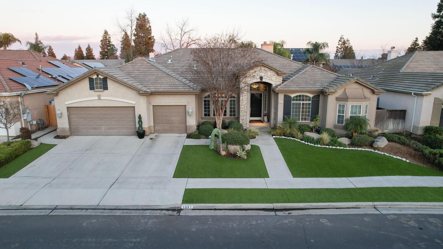 1081 North Harvard Avenue Clovis, CA 93611 - Photo 47 of 57 a front view of house with yard and green space