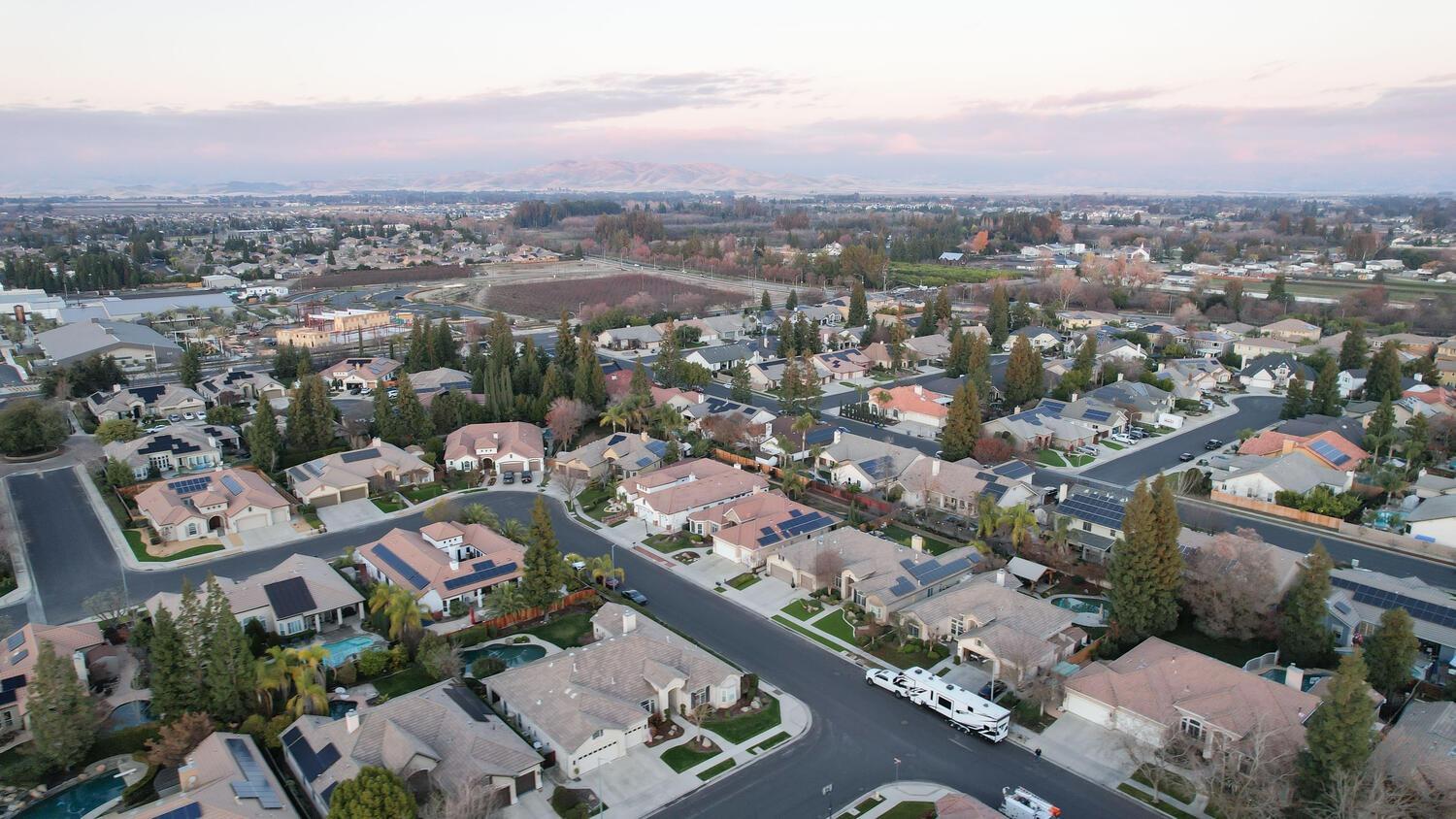 1081 North Harvard Avenue Clovis, CA 93611 - Photo 56 of 57 an aerial view of a city with lots of residential buildings