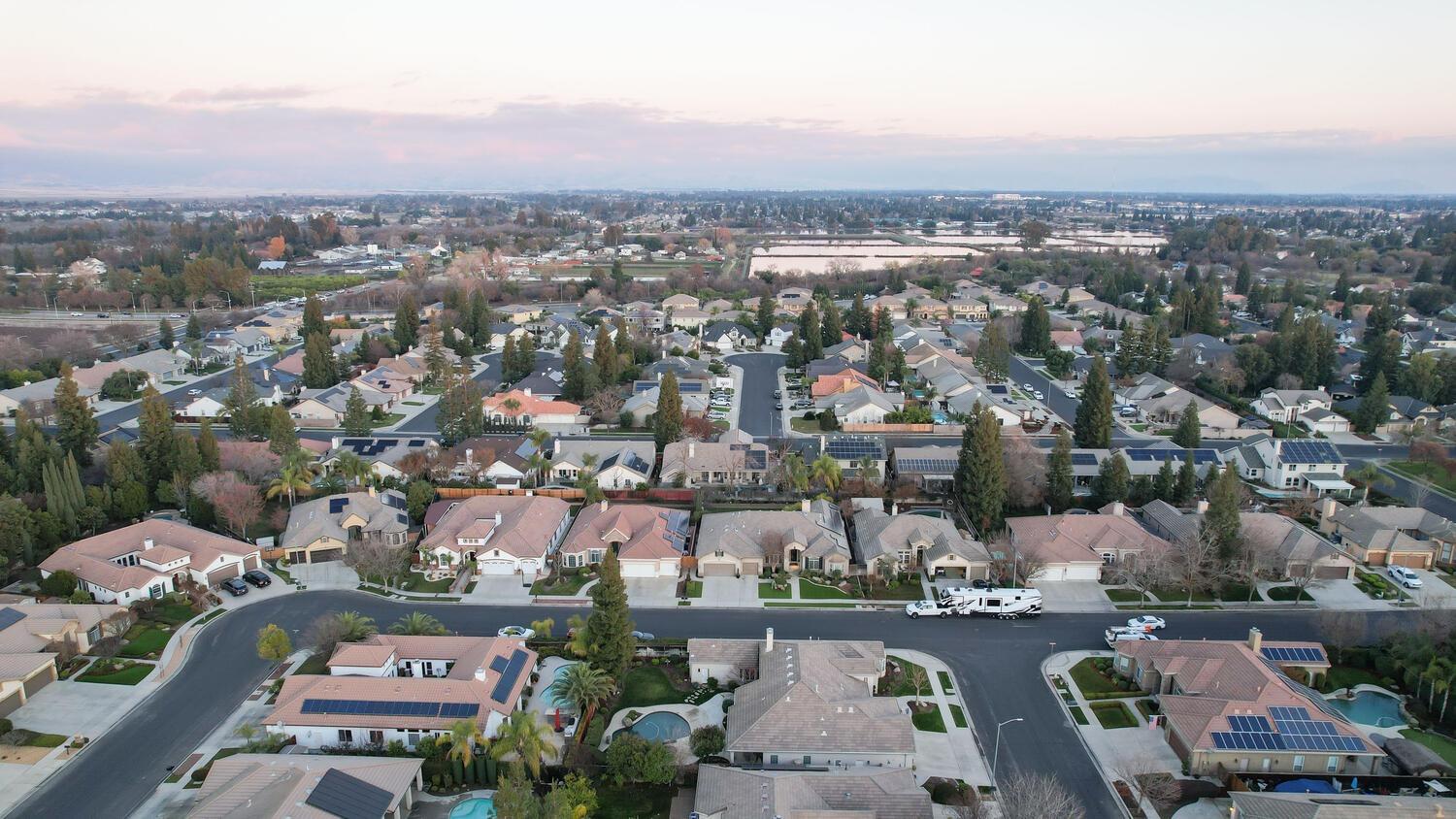 1081 North Harvard Avenue Clovis, CA 93611 - Photo 57 of 57 an aerial view of residential houses with outdoor space