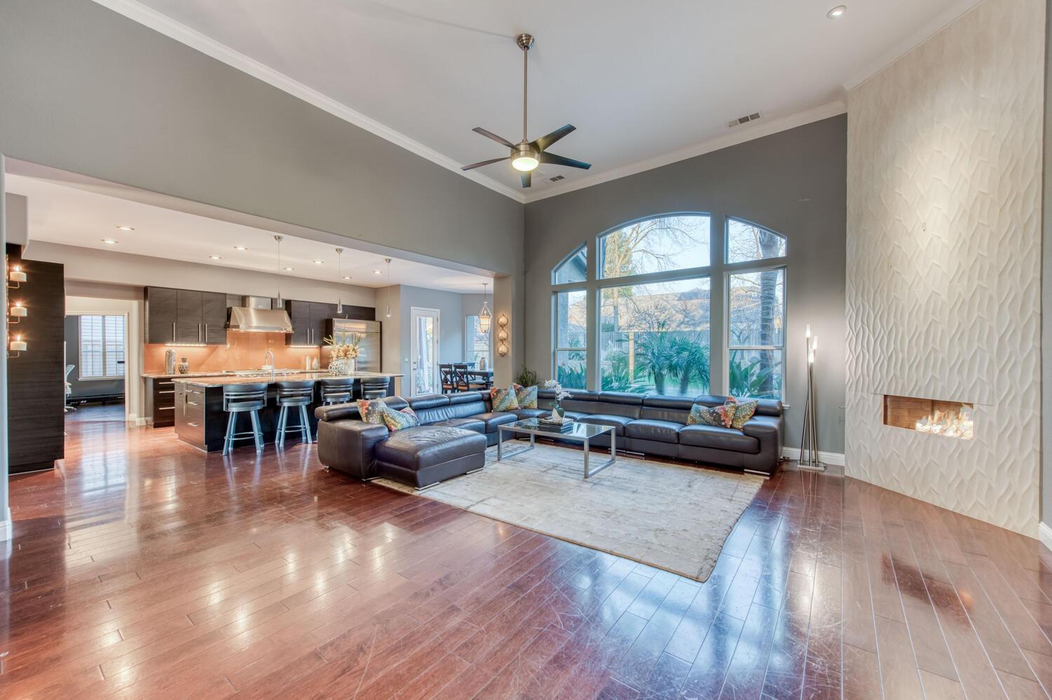 1081 North Harvard Avenue Clovis, CA 93611 - Photo 8 of 57 a living room with furniture and a large window