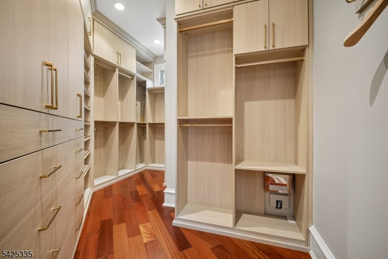 318 Franklin Road Denville, NJ 07834 - Photo 12 of 40 a view of walk in closet with empty racks