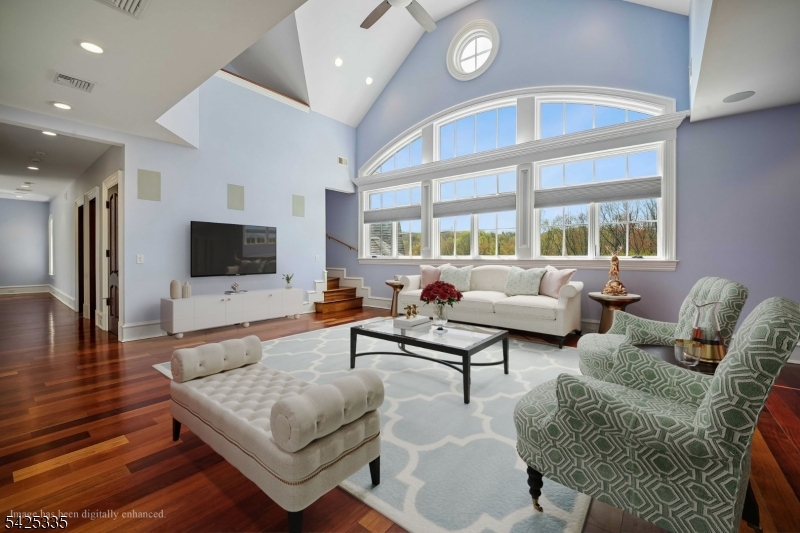 318 Franklin Road Denville, NJ 07834 - Photo 17 of 40 a living room with furniture and a flat screen tv