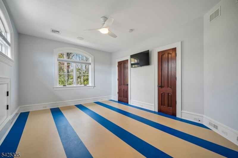 318 Franklin Road Denville, NJ 07834 - Photo 18 of 40 a view of an empty room with a window