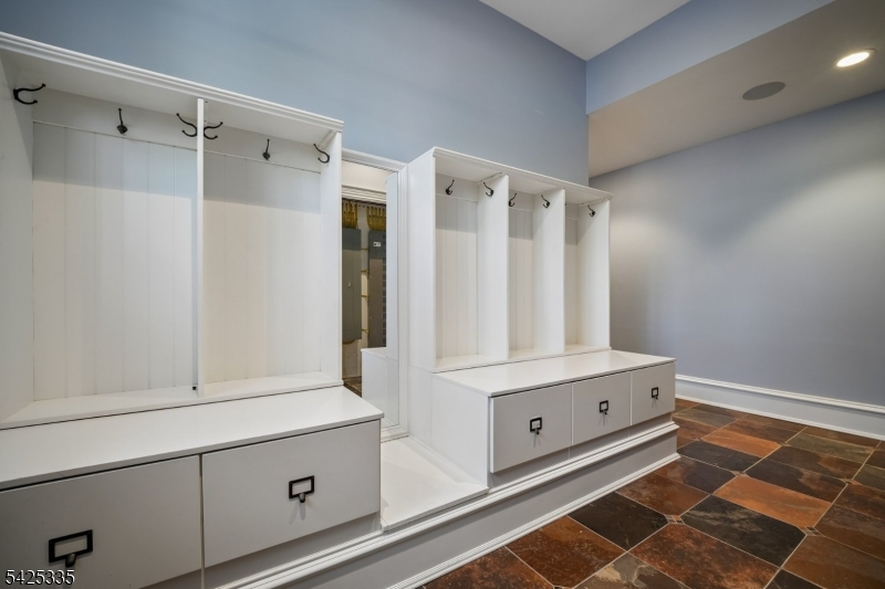 318 Franklin Road Denville, NJ 07834 - Photo 30 of 40 a bathroom with a mirror and a shower