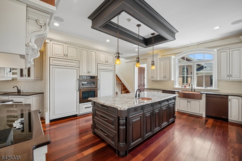 318 Franklin Road Denville, NJ 07834 - Photo 4 of 40 a kitchen with stainless steel appliances granite countertop a stove and a refrigerator