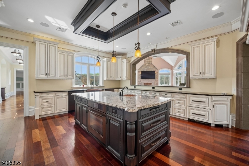 318 Franklin Road Denville, NJ 07834 - Photo 5 of 40 a kitchen with stainless steel appliances granite countertop a stove and a sink