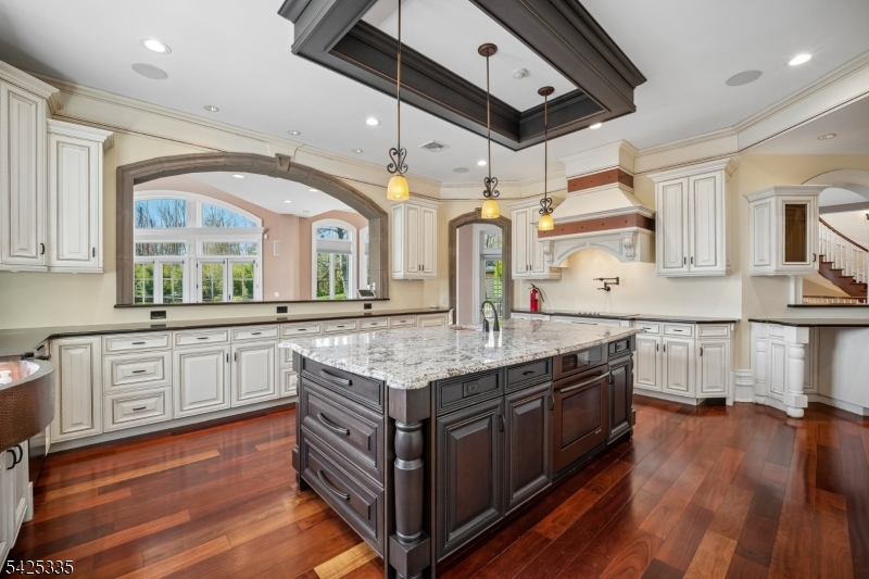 318 Franklin Road Denville, NJ 07834 - Photo 6 of 40 a kitchen with stainless steel appliances granite countertop a stove and cabinets