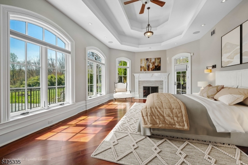 318 Franklin Road Denville, NJ 07834 - Photo 8 of 40 a bed sitting in a spacious bedroom next to a window
