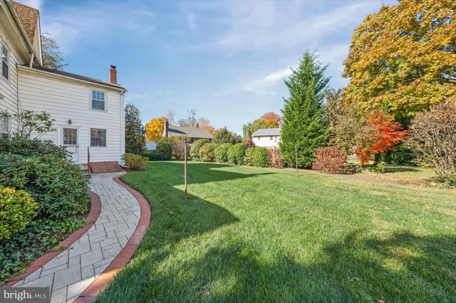a view of a house with a back yard