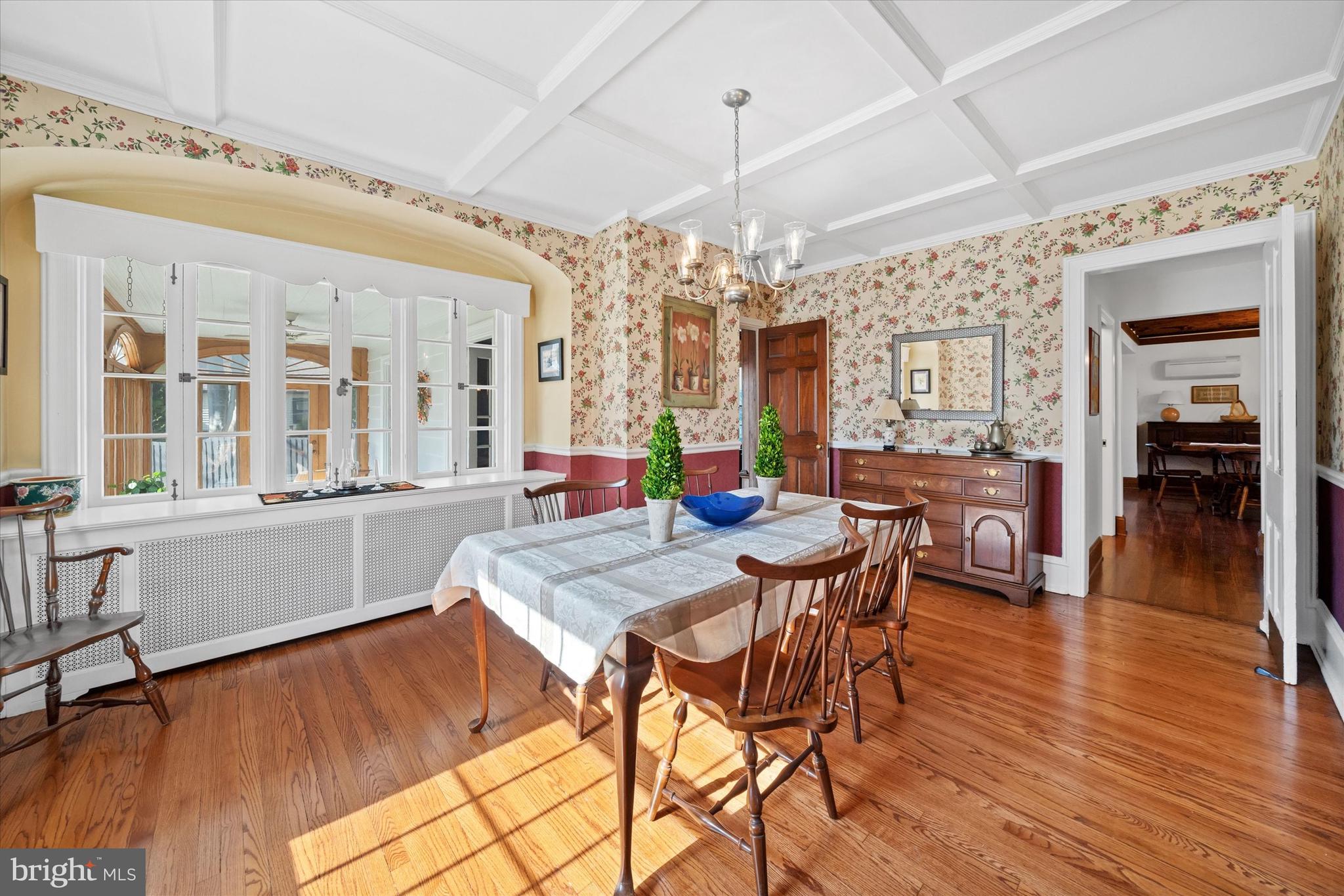 1509 Turkey Run Road Wilmington, DE 19803 - Photo 5 of 31 a view of a dining room with furniture and wooden floor
