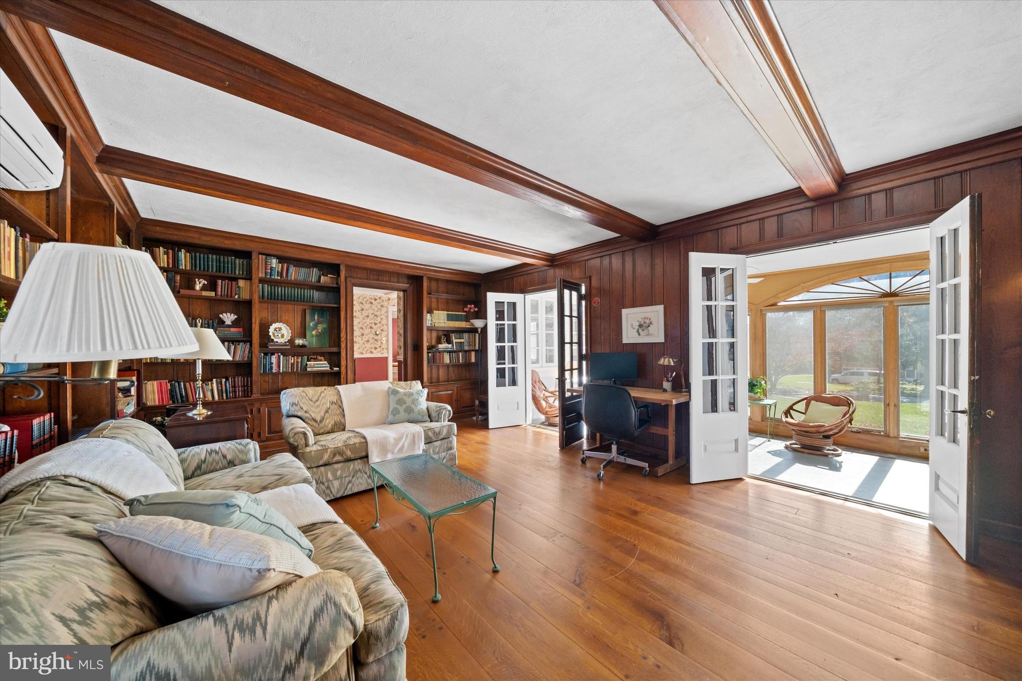 1509 Turkey Run Road Wilmington, DE 19803 - Photo 7 of 31 a living room with furniture and a fireplace