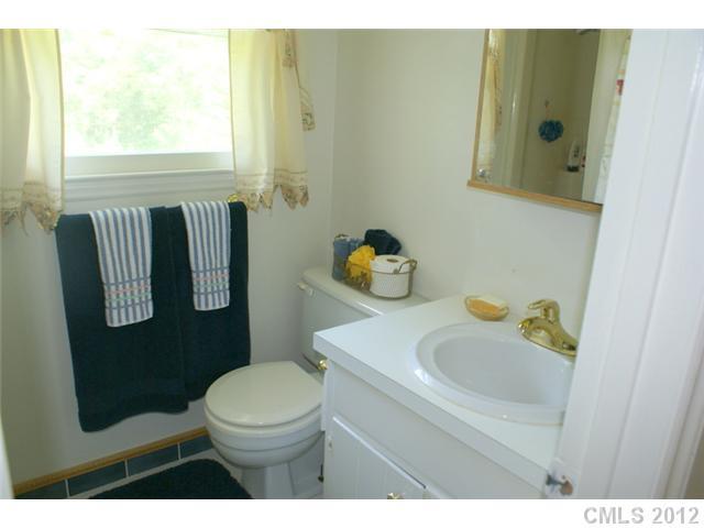 12 Friendfield Court Fort Mill, SC 29715 - Photo 13 of 15 a bathroom with a sink toilet and tub