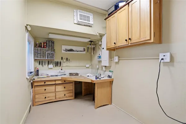 a bathroom with a double vanity sink a toilet and a mirror