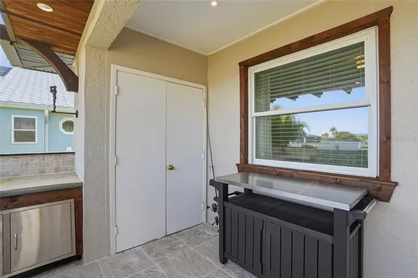 a view of a sink and a window