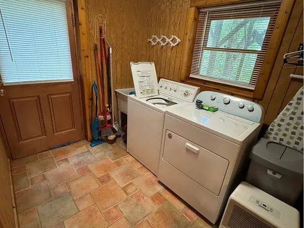 a utility room with dryer and washer