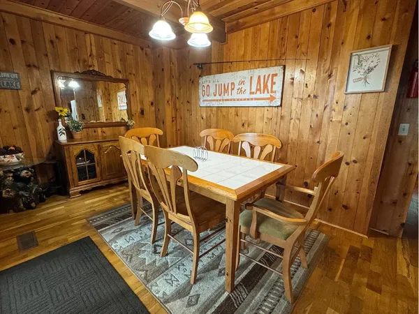a view of a dining room with furniture