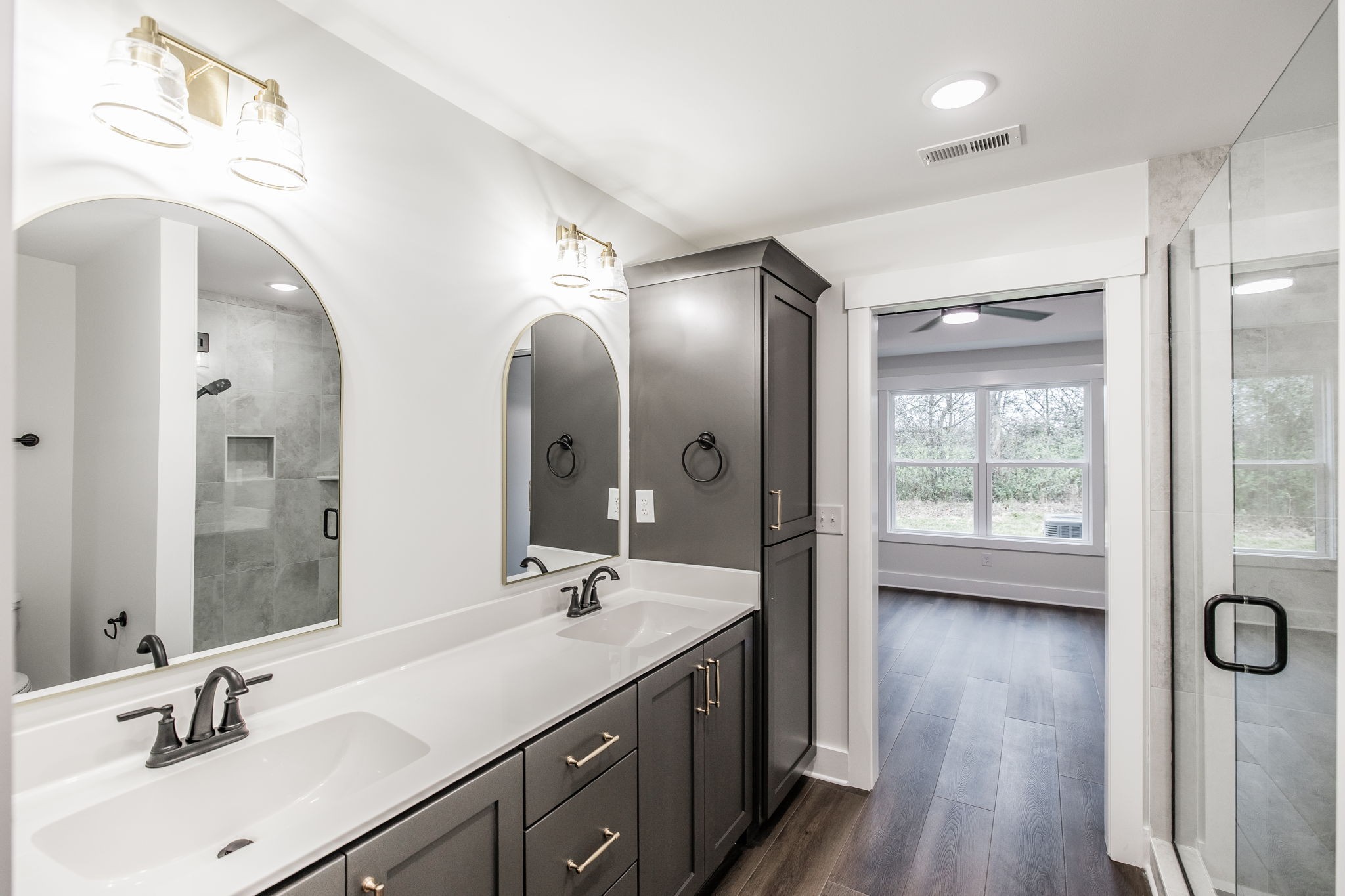2157 Rylee Way Greenbrier, TN 37073 - Photo 21 of 35 a spacious bathroom with a double vanity sink a mirror and shower
