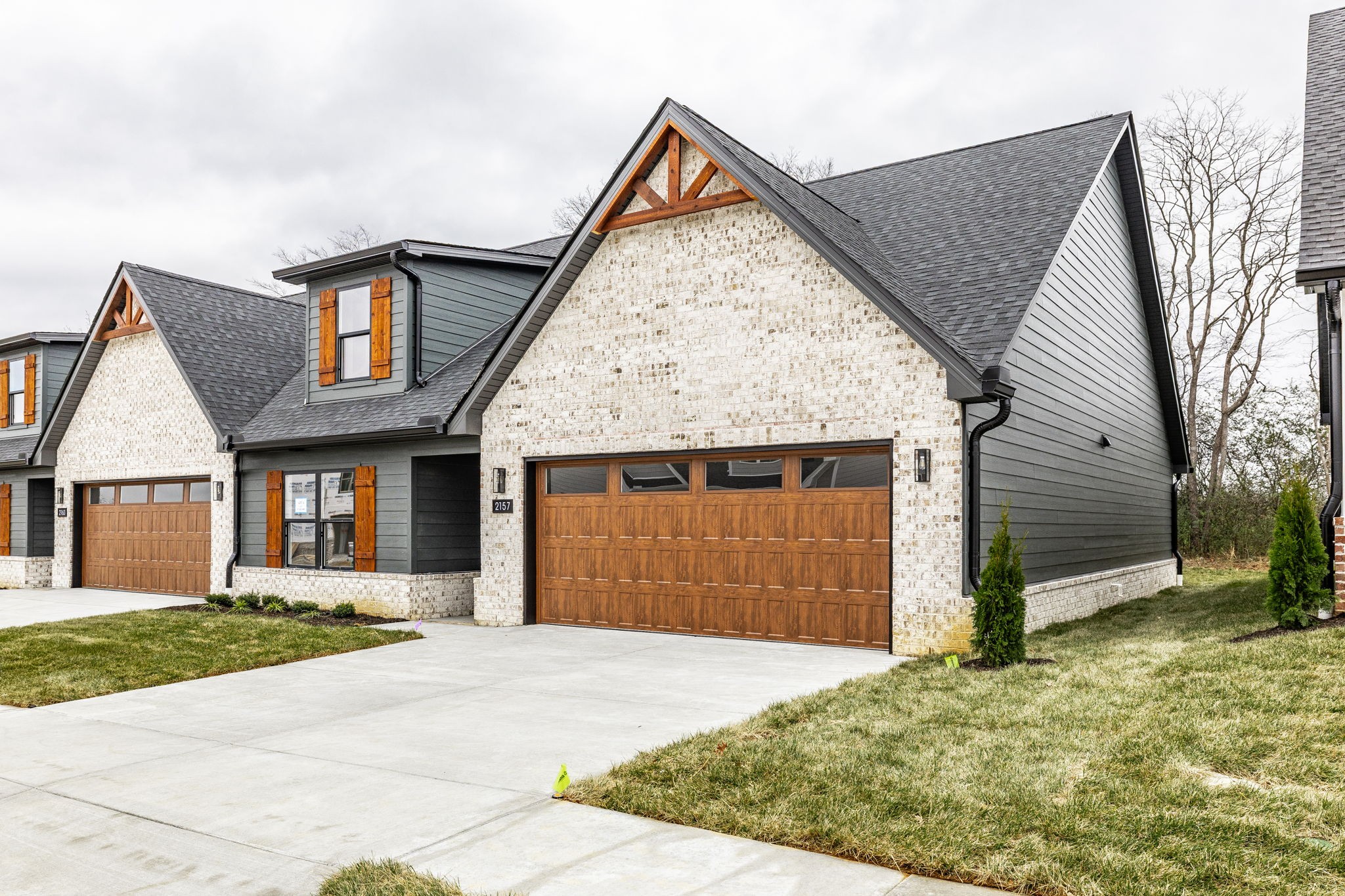2157 Rylee Way Greenbrier, TN 37073 - Photo 35 of 35 a front view of a house with a yard and garage