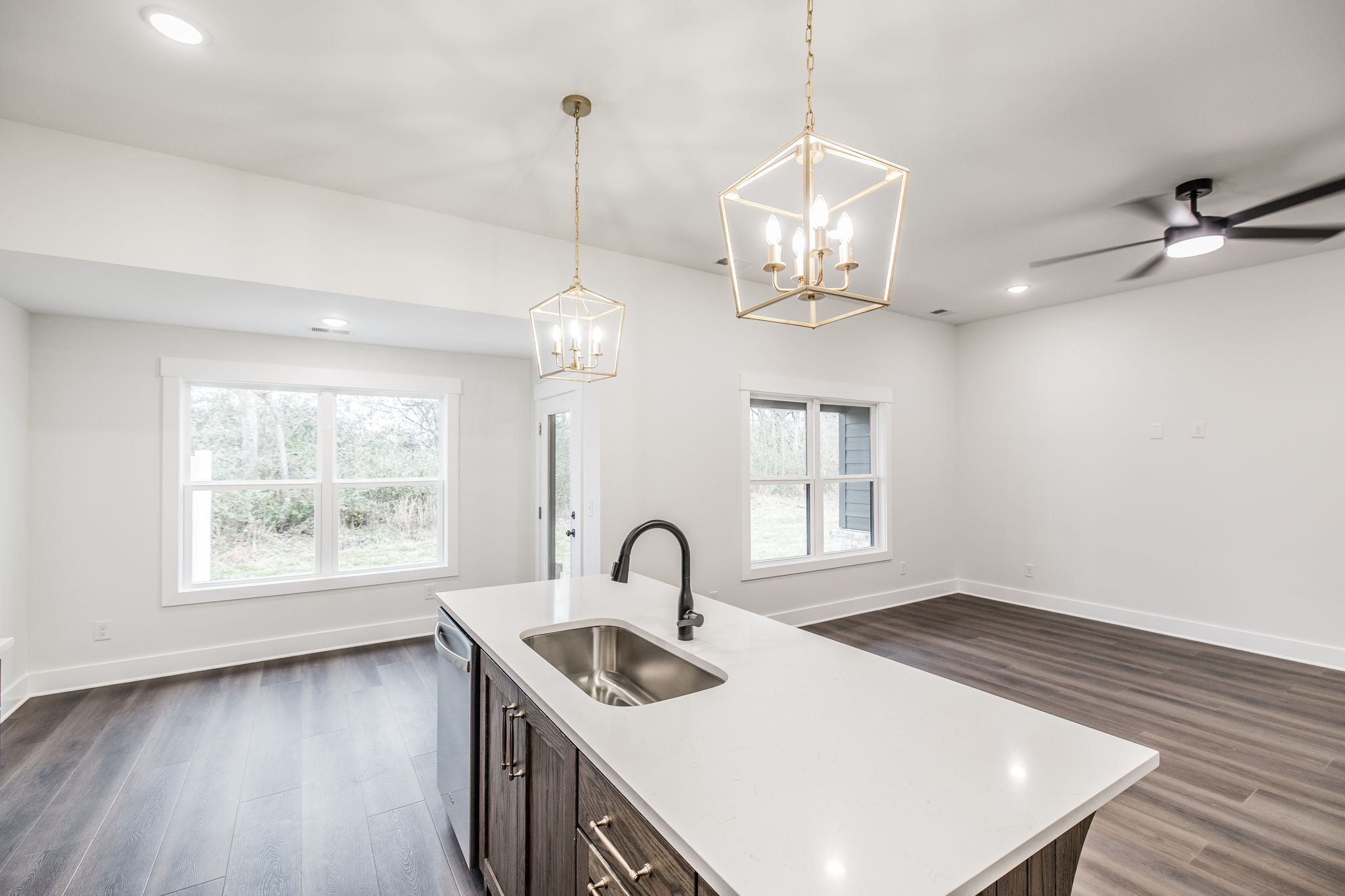 2157 Rylee Way Greenbrier, TN 37073 - Photo 9 of 35 a view of an empty room with a window and wooden floor
