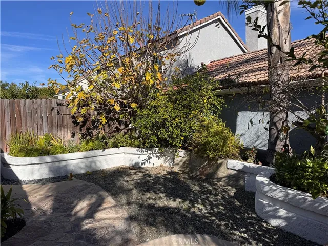 a view of a back yard of the house