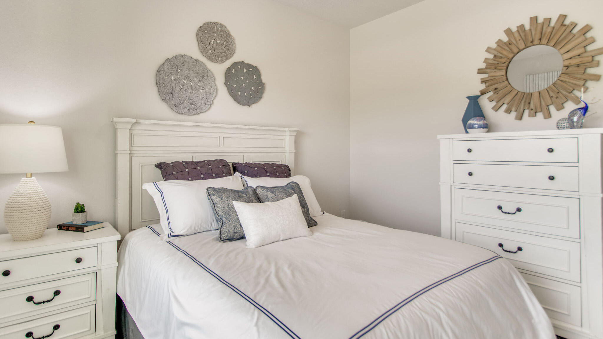 4647 Marine Loop Crestview, FL 32539 - Photo 26 of 34 a bedroom with a bed and cabinets