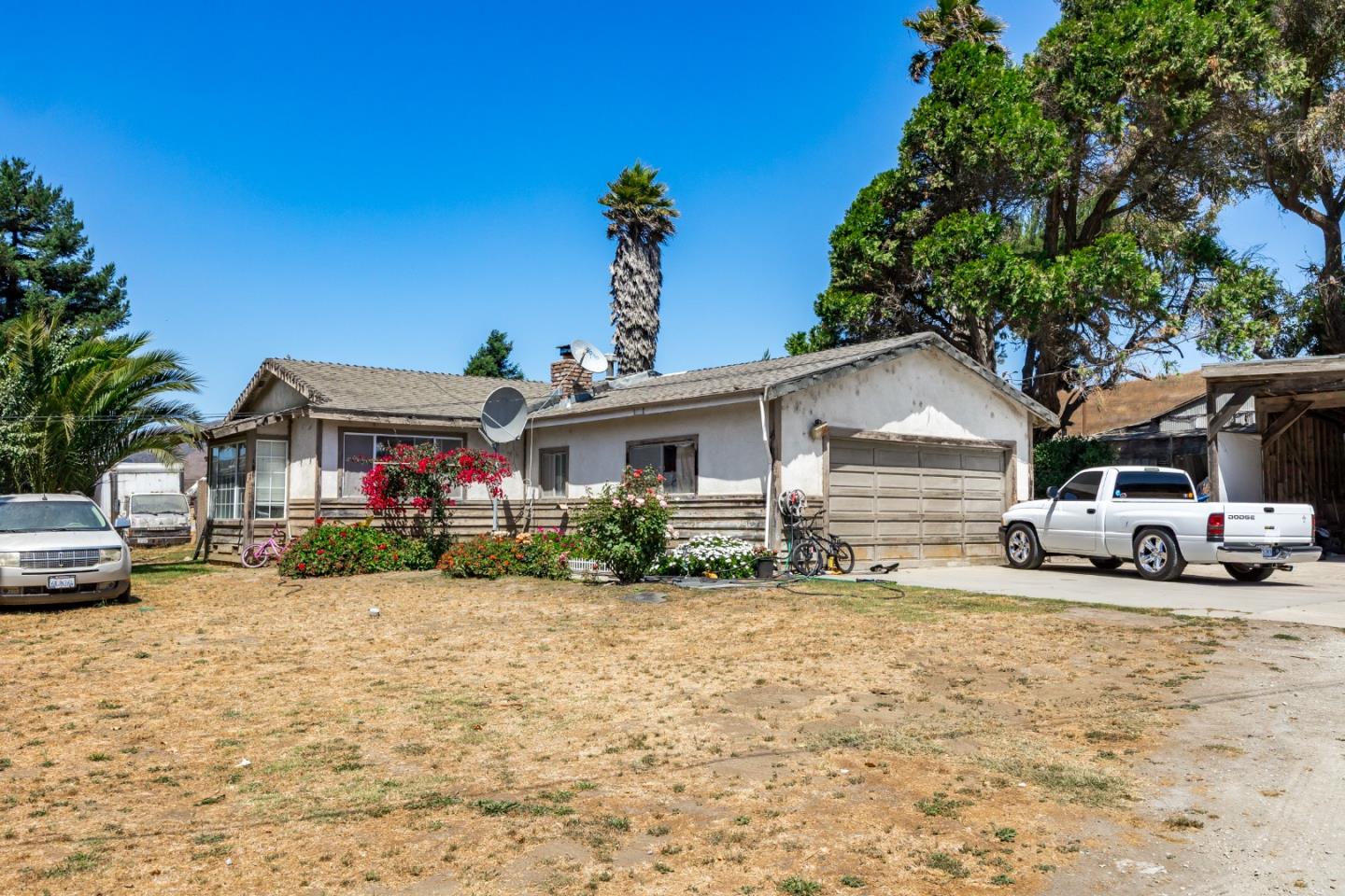250 Old Chittenden Road Watsonville, CA 95076 - Photo 5 of 22 a view of a house with a yard and sitting area