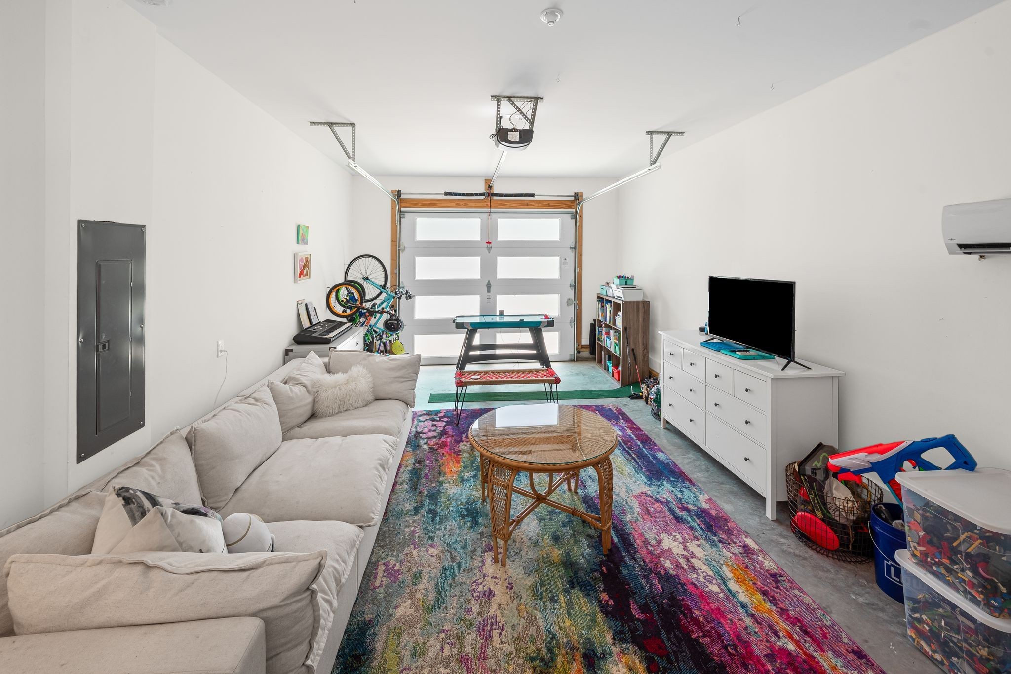 317 Manzano Road Madison, TN 37115 - Photo 16 of 42 a living room with furniture and a flat screen tv