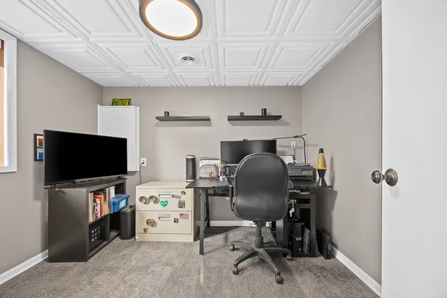 a view of livingroom with furniture and a flat screen tv