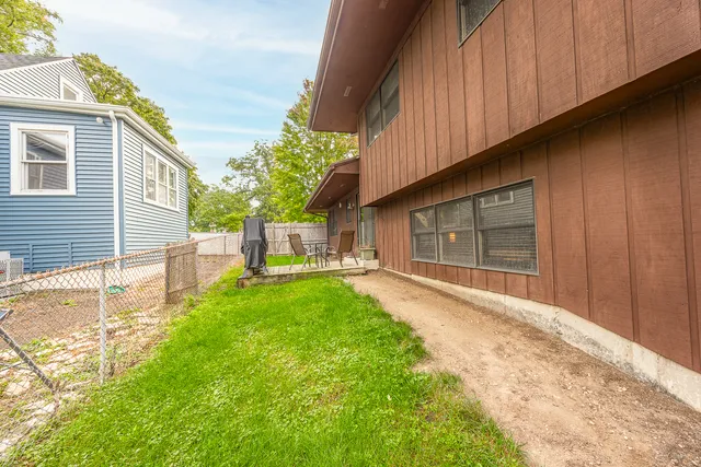 a view of a back yard of the house