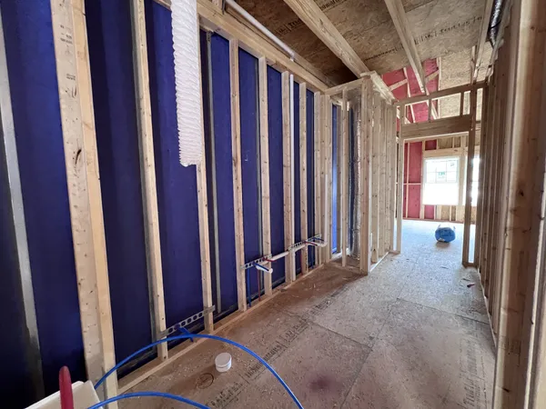 a view of a room with large windows