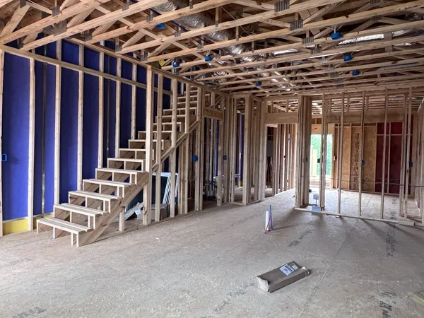 a view of a room with wooden walls