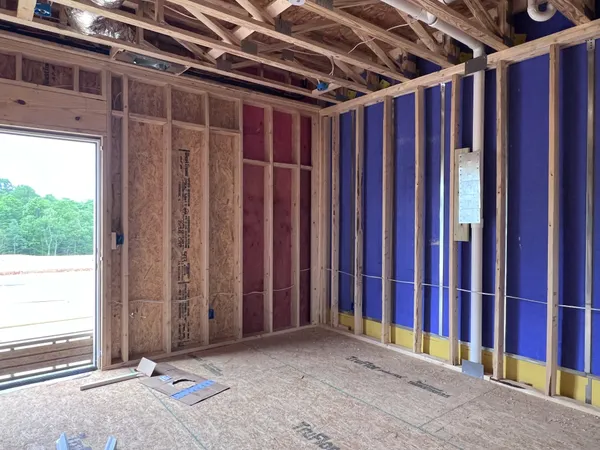 a view of a room with wooden walls