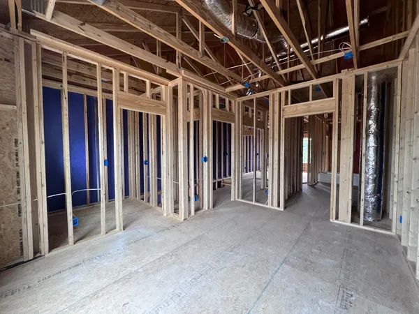 a view of outdoor space with wooden wall