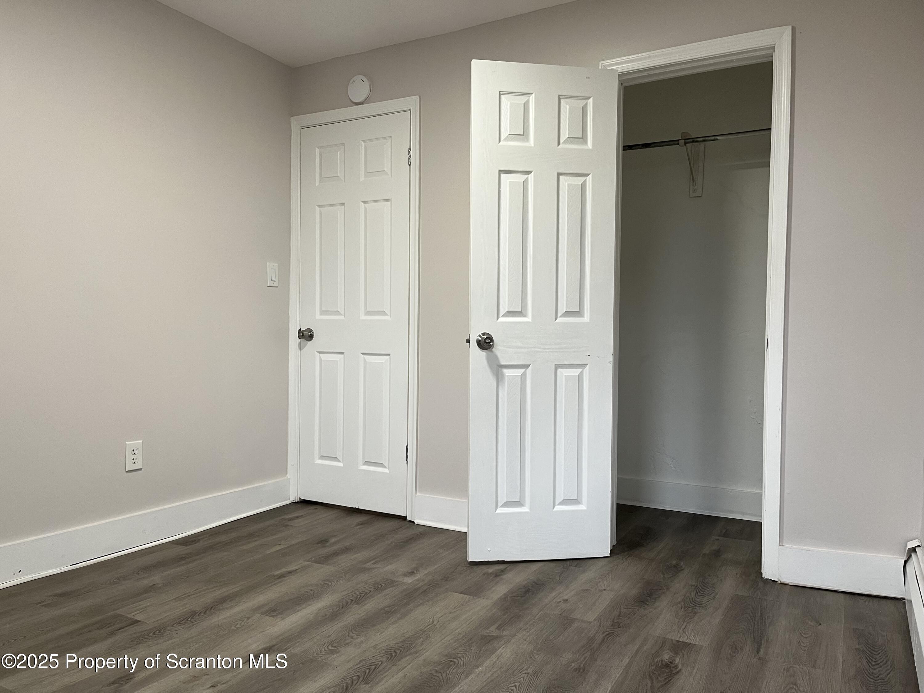 315 Aswell Court Scranton, PA 18504 - Photo 12 of 17 an empty room with wooden floor